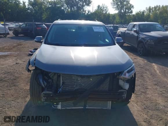 2021 Chevrolet Traverse LT Cloth z VIN 1GNERGKW3MJ157258, wystawiony jako IAAI lot #43197252 z przebiegiem 35 884 mil mil oraz . Historia ofert i sprzedaży dostępna na DreamBid. Obrazek 13.