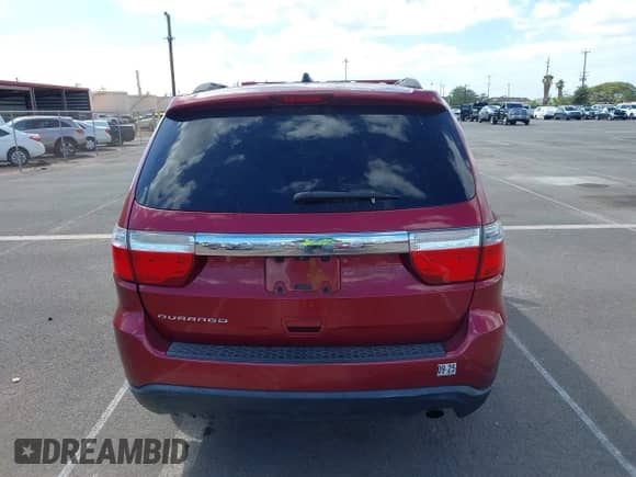 2013 Dodge Durango SXT with VIN 1C4RDHAG7DC685771, listed as a IAAI auction lot 43464816 with 149,141 mi miles and . Bid and sale history available at DreamBid. Image 16.