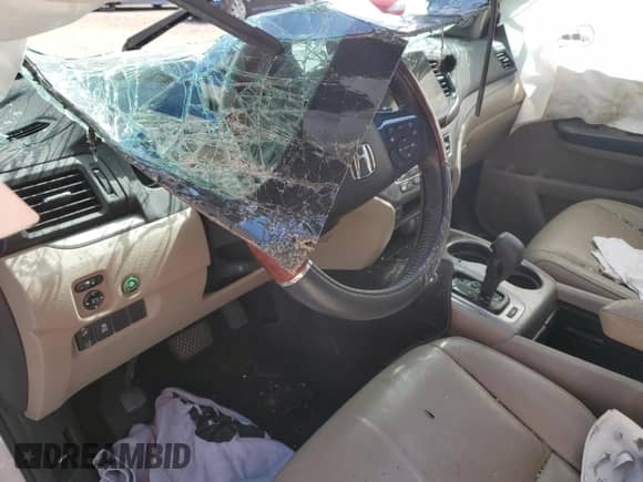 2019 Honda Pilot EX-L z VIN 5FNYF6H59KB063154, wystawiony jako Copart lot #69396675 z przebiegiem Nie podano mil oraz Szkoda całkowita • Salvage title. Historia ofert i sprzedaży dostępna na DreamBid. Obrazek 8.