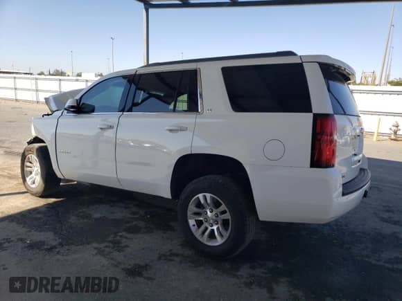 2015 Chevrolet Tahoe LT with VIN 1GNSKBKC2FR182883, listed as a Copart auction lot 70604715 with Not provided miles and Salvage title. Bid and sale history available at DreamBid. Image 2.