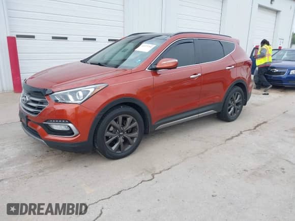 2018 Hyundai Santa Fe Ultimate with VIN 5XYZWDLA5JG522703, listed as a IAAI auction lot 42377253 with 143,116 mi miles and . Bid and sale history available at DreamBid. Image 2.