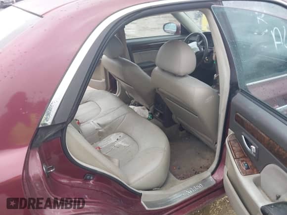 2003 Hyundai XG z VIN KMHFU45E43A257473, wystawiony jako IAAI lot #41385881 z przebiegiem 184 165 mil mil oraz . Historia ofert i sprzedaży dostępna na DreamBid. Obrazek 8.