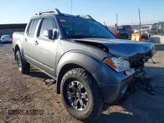 2020 Nissan Frontier Pro-4X with VIN 1N6ED0EB1LN708265, listed as a IAAI auction lot 41398914 with 98,665 mi miles and . Bid and sale history available at DreamBid. Image 1.