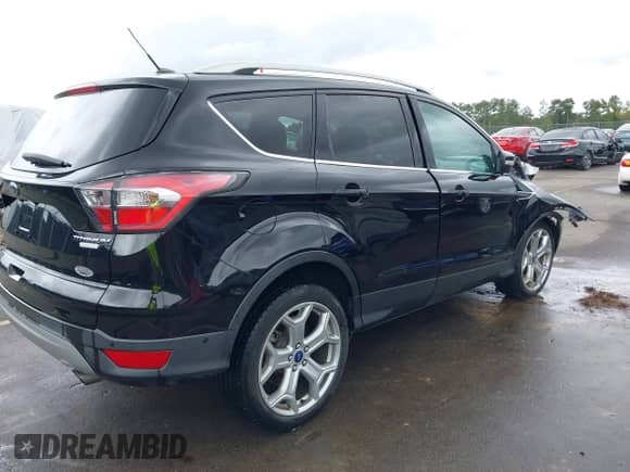 2017 Ford Escape Titanium с VIN 1FMCU0J95HUA75324, выставлен на аукционе IAAI как лот 43363180 с пробегом 85 525 миль миль и . История ставок и продаж доступна на DreamBid. Изображение 4.
