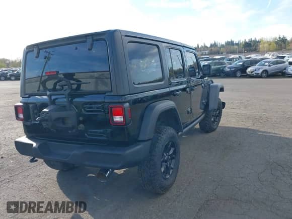 2021 Jeep Wrangler Unlimited Willys with VIN 1C4HJXDM0MW683276, listed as a IAAI auction lot 41896423 with 70,935 mi miles and . Bid and sale history available at DreamBid. Image 4.