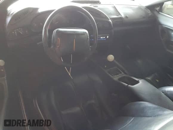 1995 Chevrolet Camaro Z28 z VIN 2G1FP22P9S2148783, wystawiony jako Copart lot #42178135 z przebiegiem 216 461 mil mil oraz Szkoda całkowita • Salvage title. Historia ofert i sprzedaży dostępna na DreamBid. Obrazek 8.