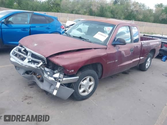 2000 Dodge Dakota Sport with VIN 1B7GL22N7YS528869, listed as a IAAI auction lot 42180439 with 169,150 mi miles and . Bid and sale history available at DreamBid. Image 17.