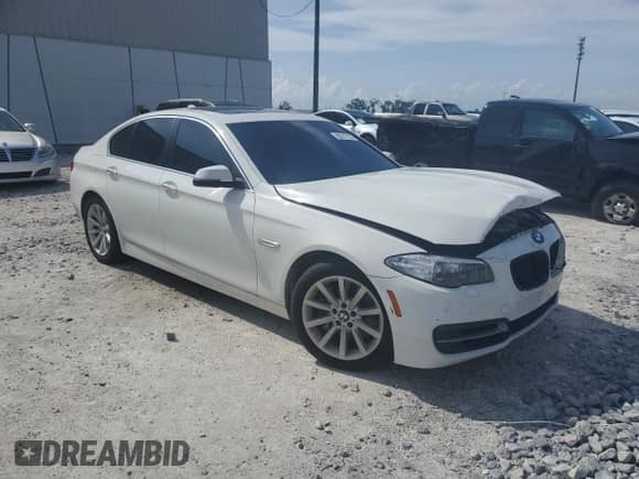 2014 BMW 5 Series 535d with VIN WBAXA5C54ED690428, listed as a Copart auction lot 65512135 with 122,813 mi miles and Salvage title. Bid and sale history available at DreamBid. Image 4.