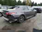 2019 Toyota Camry SE z VIN 4T1B11HK0KU207285, wystawiony jako Copart lot #82714065 z przebiegiem 57 939 mil mil oraz Szkoda całkowita • Salvage title. Historia ofert i sprzedaży dostępna na DreamBid. Obrazek 3.