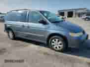 2002 Honda Odyssey LX with VIN 2HKRL18532H504584, listed as a Copart auction lot 67735975 with 230,708 mi miles and Salvage title. Bid and sale history available at DreamBid. Image 4.