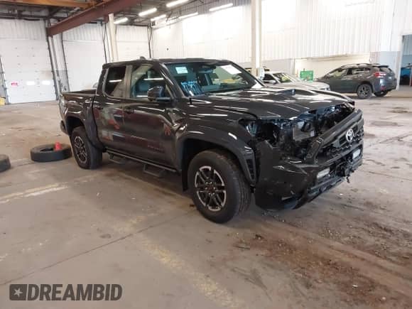 2024 Toyota Tacoma SR5 with VIN 3TMLB5JN9RM067351, listed as a IAAI auction lot 41529043 with 3,054 mi miles and . Bid and sale history available at DreamBid. Image 1.