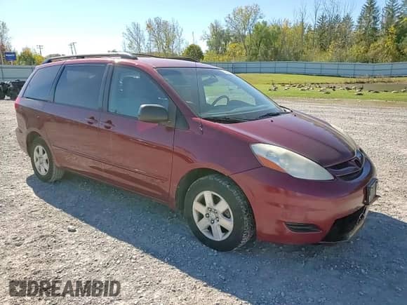 2010 Toyota Sienna LE z VIN 5TDKK4CC2AS309919, wystawiony jako Copart lot #82524135 z przebiegiem 196 955 mil mil oraz Szkoda całkowita • Salvage title. Historia ofert i sprzedaży dostępna na DreamBid. Obrazek 14.