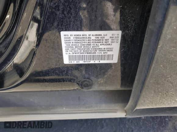 2015 Honda Pilot Touring z VIN 5FNYF3H91FB005305, wystawiony jako Copart lot #71479855 z przebiegiem 129 693 mil mil oraz Szkoda całkowita • Salvage title. Historia ofert i sprzedaży dostępna na DreamBid. Obrazek 13.