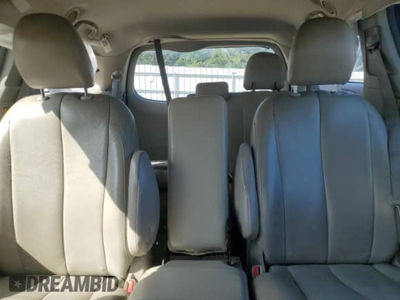 2012 Toyota Sienna with VIN 5TDZK3DC4CS184450, listed as a Copart auction lot 71284385 with 207,878 mi miles and Salvage title. Bid and sale history available at DreamBid. Image 10.