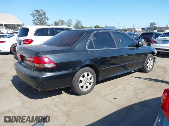 2001 Honda Accord EX with VIN JHMCG66861C018784, listed as a IAAI auction lot 42405898 with 260,816 mi miles and . Bid and sale history available at DreamBid. Image 4.