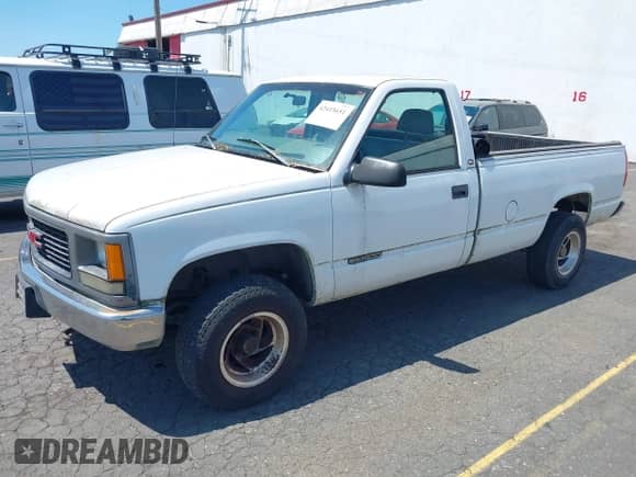 1997 GMC Sierra 1500 with VIN 1GTEK14W6VZ549578, listed as a IAAI auction lot 42415651 with 203,458 mi miles and . Bid and sale history available at DreamBid. Image 2.