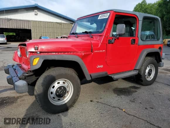 2000 Jeep Wrangler SE with VIN 1J4FA29P8YP711686, listed as a Copart auction lot 68999455 with 100,108 mi miles and Salvage title. Bid and sale history available at DreamBid. Image 1.