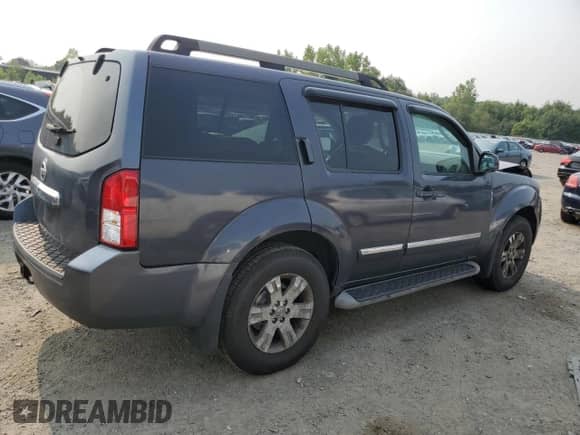 2011 Nissan Pathfinder LE z VIN 5N1AR1NB8BC620165, wystawiony jako Copart lot #67278505 z przebiegiem 190 533 mil mil oraz Czysty tytuł • Clean title. Historia ofert i sprzedaży dostępna na DreamBid. Obrazek 3.