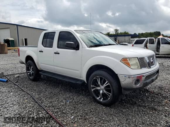 2007 Nissan Frontier SE with VIN 1N6AD07U77C463762, listed as a Copart auction lot 68481535 with 207,499 mi miles and Salvage title. Bid and sale history available at DreamBid. Image 4.