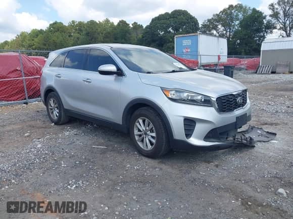 2019 Kia Sorento LX with VIN 5XYPG4A50KG564322, listed as a IAAI auction lot 43285789 with 108,164 mi miles and . Bid and sale history available at DreamBid. Image 1.