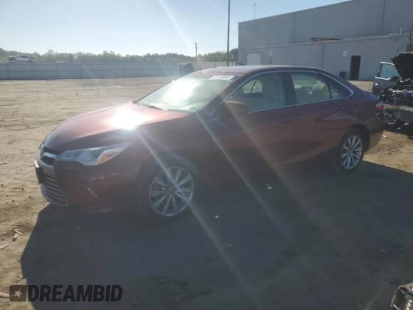 2016 Toyota Camry XLE with VIN 4T1BK1FK7GU569699, listed as a Copart auction lot 85123285 with 57,219 mi miles and Salvage title. Bid and sale history available at DreamBid. Image 1.