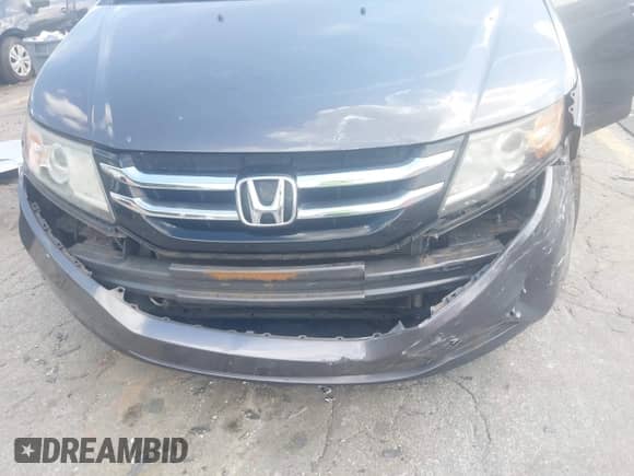 2015 Honda Odyssey Touring Elite с VIN 5FNRL5H98FB099305, выставлен на аукционе IAAI как лот 42880329 с пробегом 203 189 миль миль и . История ставок и продаж доступна на DreamBid. Изображение 6.