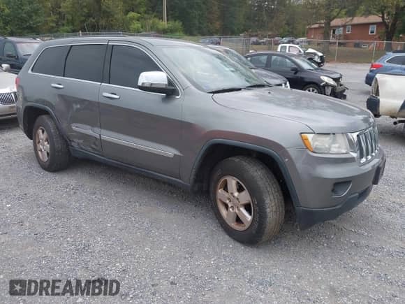 2012 Jeep Grand Cherokee Laredo with VIN 1C4RJFAG3CC272631, listed as a IAAI auction lot 43291923 with 168,220 mi miles and . Bid and sale history available at DreamBid. Image 1.