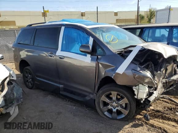 2015 Toyota Sienna SE with VIN 5TDXK3DC5FS642718, listed as a Copart auction lot 57339825 with 66,969 mi miles and Salvage title. Bid and sale history available at DreamBid. Image 4.