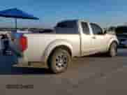 2010 Nissan Frontier SE with VIN 1N6BD0CTXAC413611, listed as a Copart auction lot 82269845 with 211,108 mi miles and Salvage title. Bid and sale history available at DreamBid. Image 3.