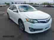 2014 Toyota Camry LE with VIN 4T1BF1FKXEU413710, listed as a IAAI auction lot 43416696 with 238,545 mi miles and . Bid and sale history available at DreamBid. Image 1.