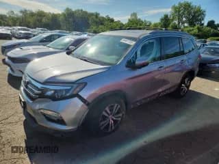 2017 Honda Pilot EX-L with VIN 5FNYF6H81HB058825, listed as a Copart auction lot 64997785 with 94,970 mi miles and Salvage title. Bid and sale history available at DreamBid. Image 1.