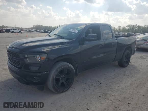 2023 Ram 1500 Big Horn z VIN 1C6RREBT6PN545366, wystawiony jako Copart lot #71802624 z przebiegiem Nie podano mil oraz Szkoda całkowita • Salvage title. Historia ofert i sprzedaży dostępna na DreamBid. Obrazek 1.