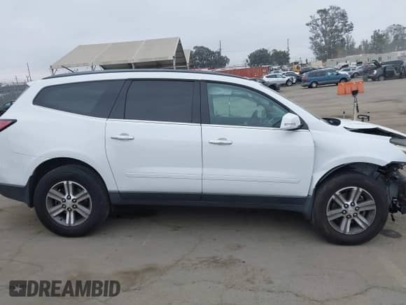 2016 Chevrolet Traverse LT z VIN 1GNKRHKD4GJ263505, wystawiony jako IAAI lot #43001840 z przebiegiem 102 987 mil mil oraz . Historia ofert i sprzedaży dostępna na DreamBid. Obrazek 14.