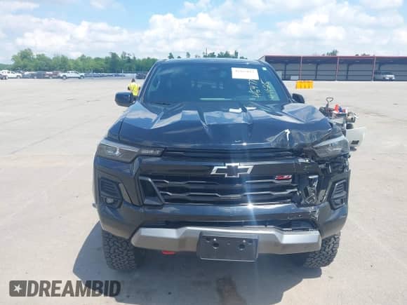 2023 Chevrolet Colorado 4WD Z71 with VIN 1GCPTDEK1P1209999, listed as a IAAI auction lot 42265017 with 13,754 mi miles and . Bid and sale history available at DreamBid. Image 13.