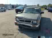 1995 Toyota Tacoma z VIN 4TAUN53B3SZ020458, wystawiony jako Copart lot #71509355 z przebiegiem 146 447 mil mil oraz Czysty tytuł • Clean title. Historia ofert i sprzedaży dostępna na DreamBid. Obrazek 13.