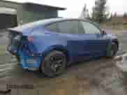 2024 Tesla Model Y Long Range with VIN 7SAYGDEE4RF986774, listed as a Copart auction lot 89833295 with 3,503 mi miles and Salvage title. Bid and sale history available at DreamBid. Image 3.