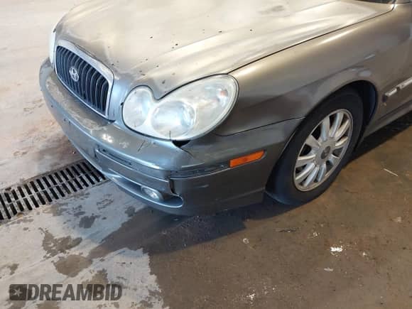 2004 Hyundai Sonata GLS z VIN KMHWF35H34A969232, wystawiony jako IAAI lot #43543635 z przebiegiem 142 476 mil mil oraz . Historia ofert i sprzedaży dostępna na DreamBid. Obrazek 6.