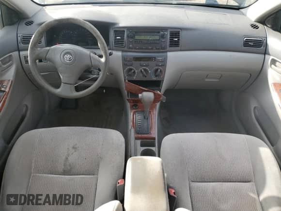 2006 Toyota Corolla LE z VIN 2T1BR32E16C621027, wystawiony jako Copart lot #82719205 z przebiegiem 234 878 mil mil oraz Czysty tytuł • Clean title. Historia ofert i sprzedaży dostępna na DreamBid. Obrazek 8.