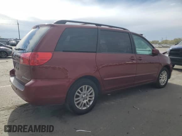 2010 Toyota Sienna XLE с VIN 5TDYK4CC1AS342159, выставлен на аукционе Copart как лот 84412115 с пробегом 214 042 миль миль и Списание • Salvage title. История ставок и продаж доступна на DreamBid. Изображение 3.