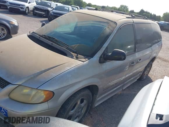 2001 Dodge Caravan ES with VIN 2B8GP54L01R336178, listed as a IAAI auction lot 42681084 with 127,685 mi miles and . Bid and sale history available at DreamBid. Image 2.