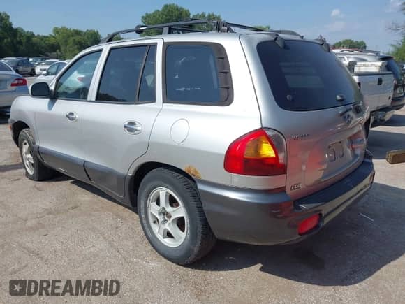 2004 Hyundai Santa Fe GLS with VIN KM8SC73E94U665022, listed as a IAAI auction lot 43022376 with 220,295 mi miles and . Bid and sale history available at DreamBid. Image 3.