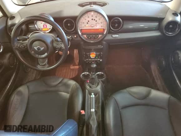 2012 MINI Hardtop S with VIN WMWSV3C51CTY16623, listed as a Copart auction lot 67827615 with 83,852 mi miles and Salvage title. Bid and sale history available at DreamBid. Image 8.