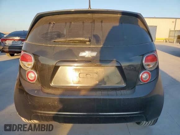 2013 Chevrolet Sonic LT with VIN 1G1JC6SH5D4228455, listed as a Copart auction lot 85344065 with 183,004 mi miles and Salvage title. Bid and sale history available at DreamBid. Image 6.