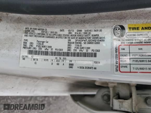 2013 Ford Fiesta S z VIN 3FADP4TJ2DM215459, wystawiony jako Copart lot #71594815 z przebiegiem 215 994 mil mil oraz Szkoda całkowita • Salvage title. Historia ofert i sprzedaży dostępna na DreamBid. Obrazek 13.