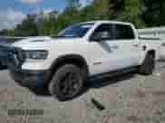 2022 Ram 1500 Rebel z VIN 1C6SRFLM2NN116060, wystawiony jako Copart lot #65881885 z przebiegiem 67 490 mil mil oraz Nie do naprawy • Non repairable. Historia ofert i sprzedaży dostępna na DreamBid. Obrazek 1.