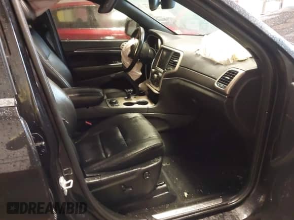 2014 Jeep Grand Cherokee Limited with VIN 1C4RJFBG9EC195927, listed as a IAAI auction lot 43293023 with 124,453 mi miles and . Bid and sale history available at DreamBid. Image 5.