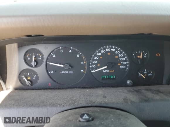 2004 Jeep Grand Cherokee Laredo with VIN 1J4GX48S14C220124, listed as a Copart auction lot 84979245 with 237,797 mi miles and Salvage title. Bid and sale history available at DreamBid. Image 9.