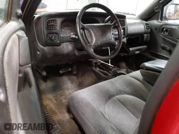 1999 Dodge Dakota SLT z VIN 1B7GG22Y4XS272025, wystawiony jako Copart lot #57658395 z przebiegiem 246 762 mil mil oraz Czysty tytuł • Clean title. Historia ofert i sprzedaży dostępna na DreamBid. Obrazek 8.