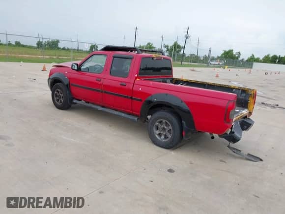 2002 Nissan Frontier SE with VIN 1N6ED29X72C328522, listed as a IAAI auction lot 42882409 with 230,086 mi miles and . Bid and sale history available at DreamBid. Image 3.