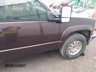 1997 Chevrolet Tahoe z VIN 3GNEK18R0VG127205, wystawiony jako IAAI lot #41531547 z przebiegiem 161 049 mil mil oraz . Historia ofert i sprzedaży dostępna na DreamBid. Obrazek 1.